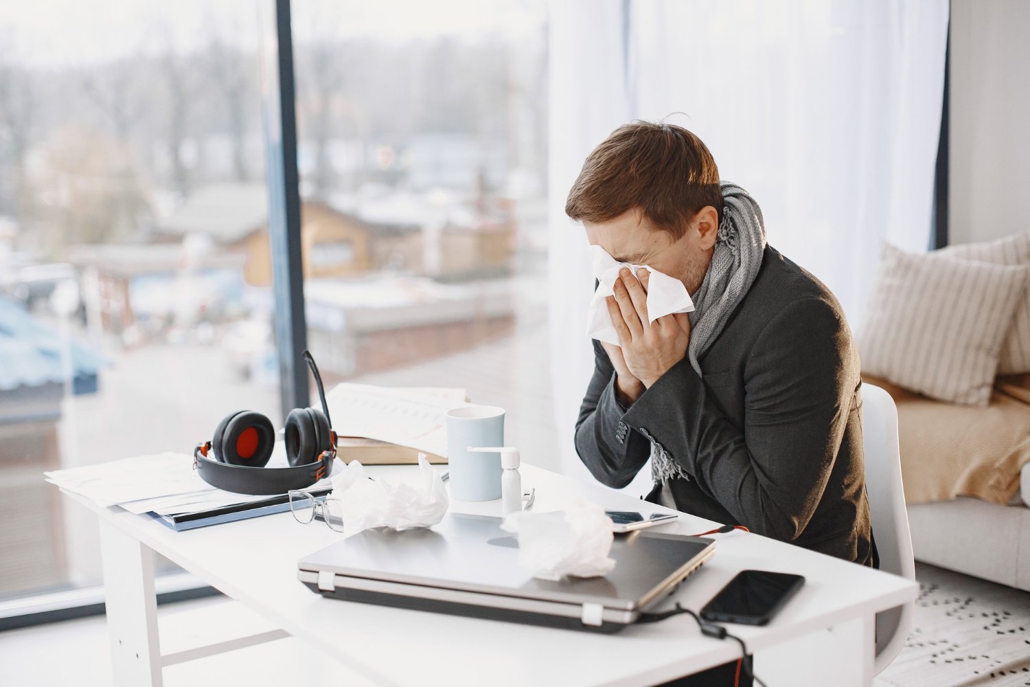 Man with a sore throat and cough